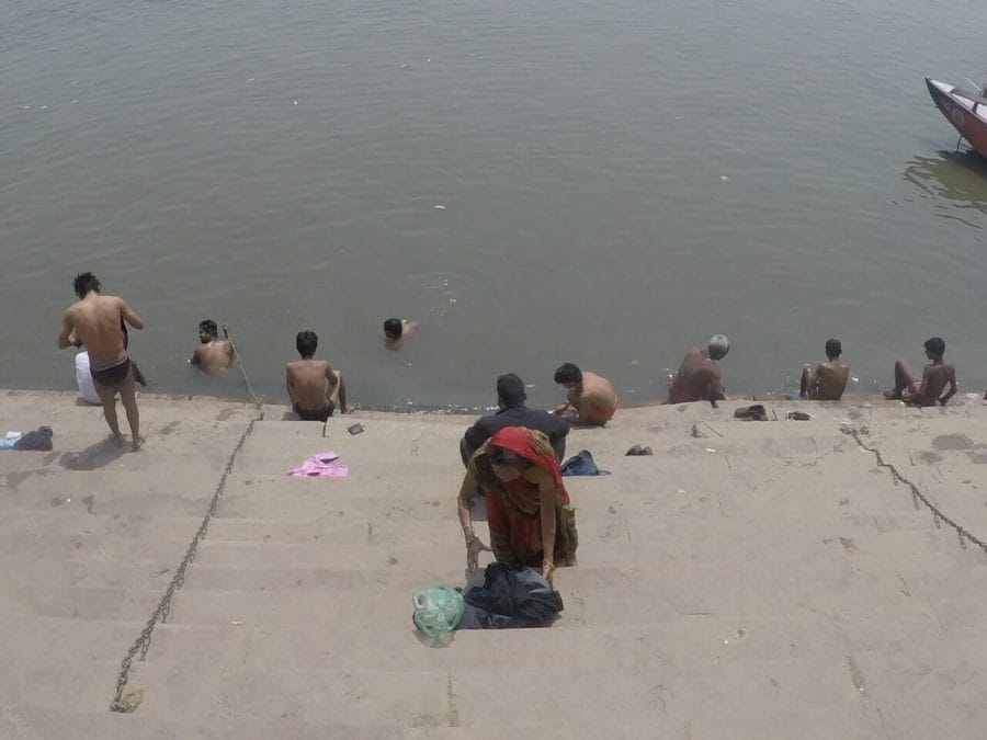 People bathing and washing clothes on the Gangs River in Varanasi