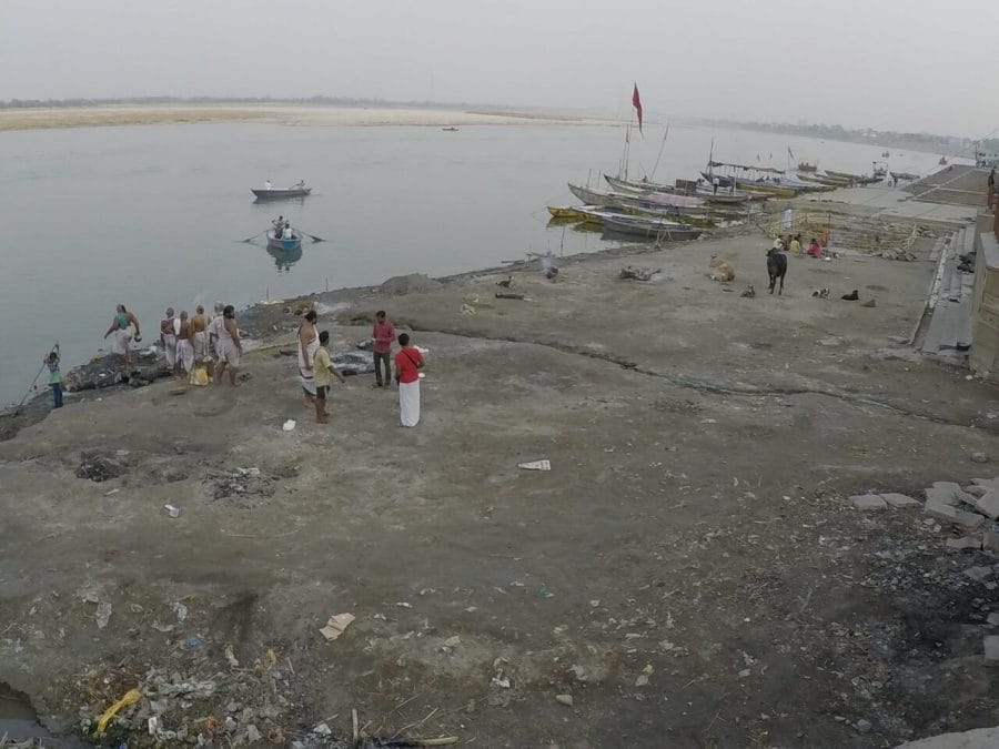 people gathering in Harischandra Ghat and the Ganges River, Varanasi