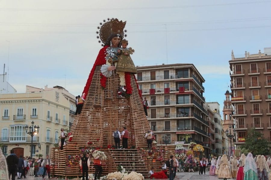 The imposing image of the saint towering at Plaza de la Virgen during the Flower Parade