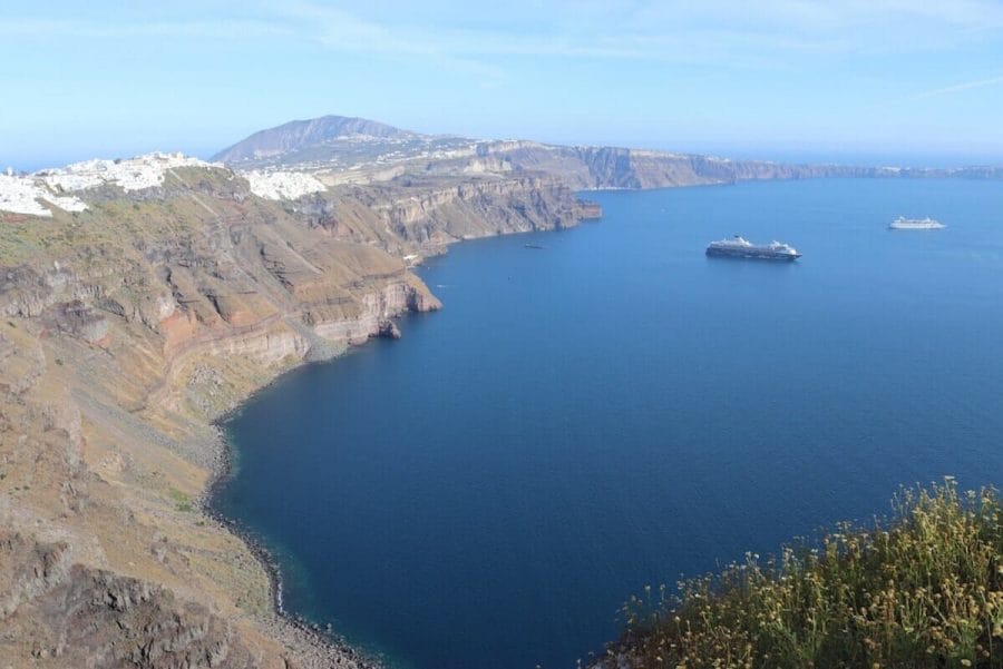 7 Best Things to Do in Imerovigli 2 The south part of the main island Thira and the villages of Firostefani and Fira and the Agean Sea.