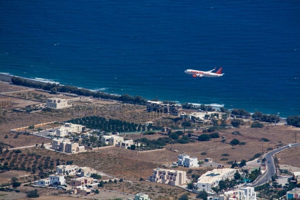an Easy jet flight flying above Santorini 