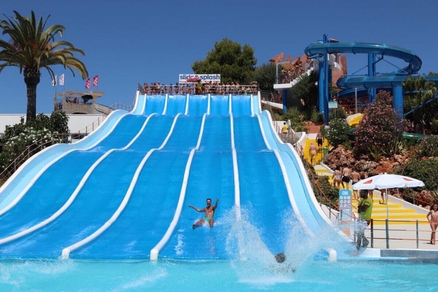 A man sliding down on a waterslide at Slide and Splash, one of Algarve best waterparks