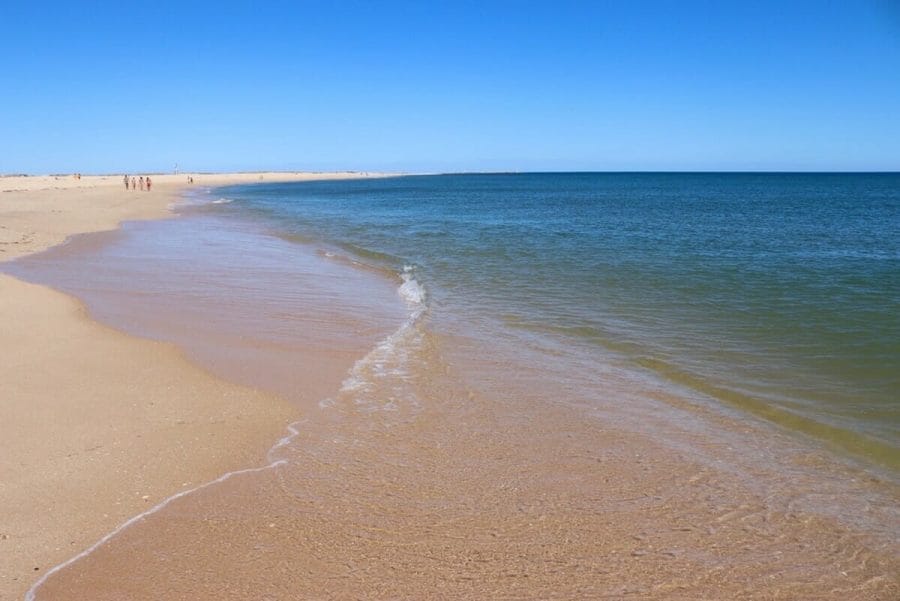 The crystal-clear water of Ilha Deserta, Faro, Algarve, Portugal