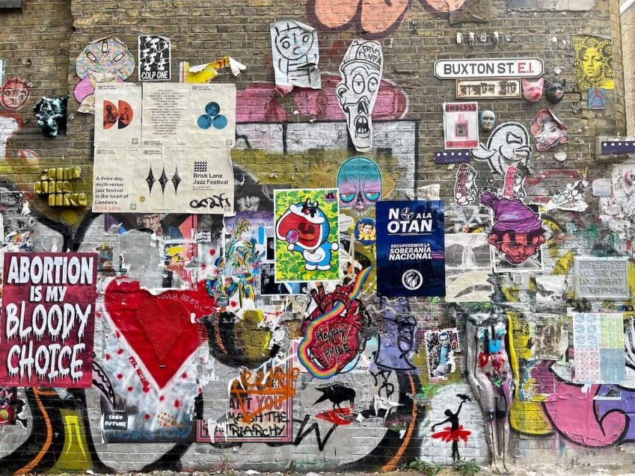 A diverse range of street art on Buxton Street, London