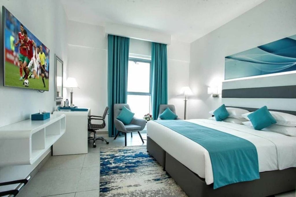 Where to Stay in Dubai: Best Areas & Hotels 25 City Avenue Al Reqqa Hotel executive double bed room, Deira, Dubai