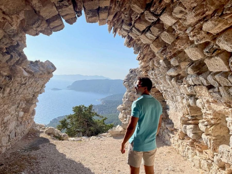 17 Pictures to Prove That Rhodes Should Be Your Next Greek Destination 12 Pericles Rosa, wearing a blue polo and beige shorts, at the ruins of Monolithos,
Castle, Rhodes, Greece